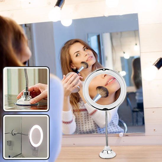 Femme se maquille devant miroir grossissant